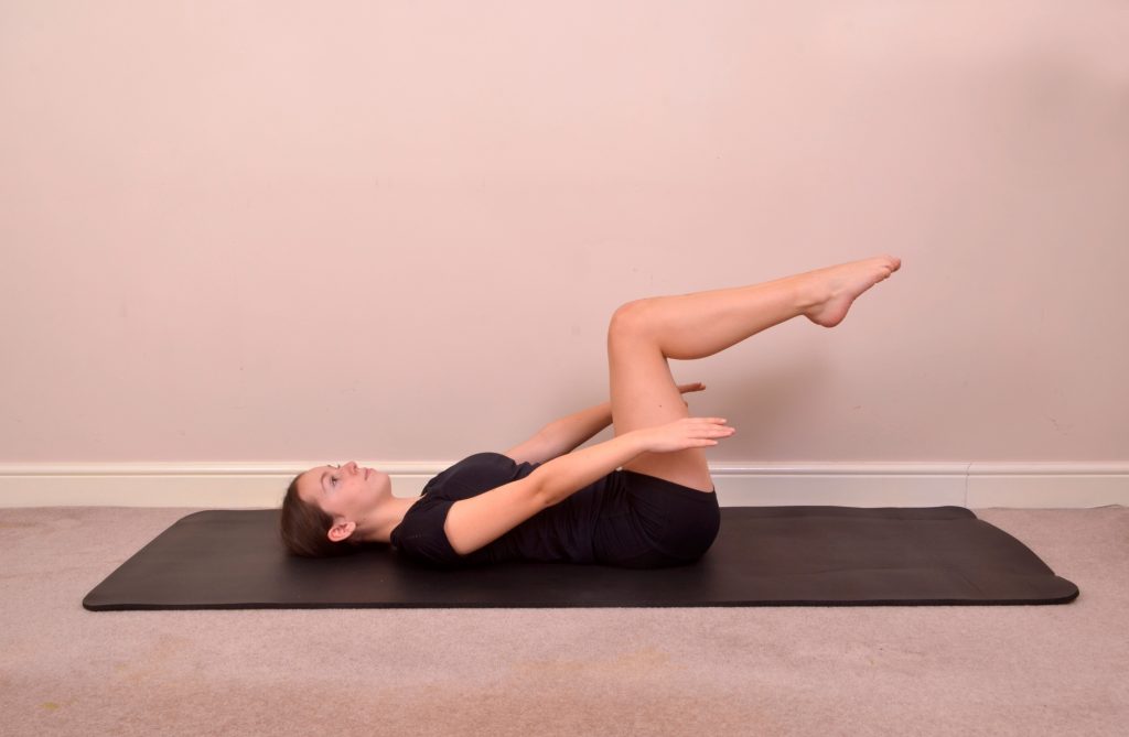 Person In Pilates pose